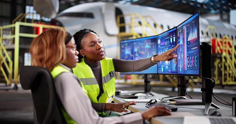 workers at a computer